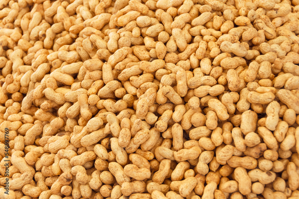 Peanut in a shell texture, food background. Peanut in a shell texture, food background.