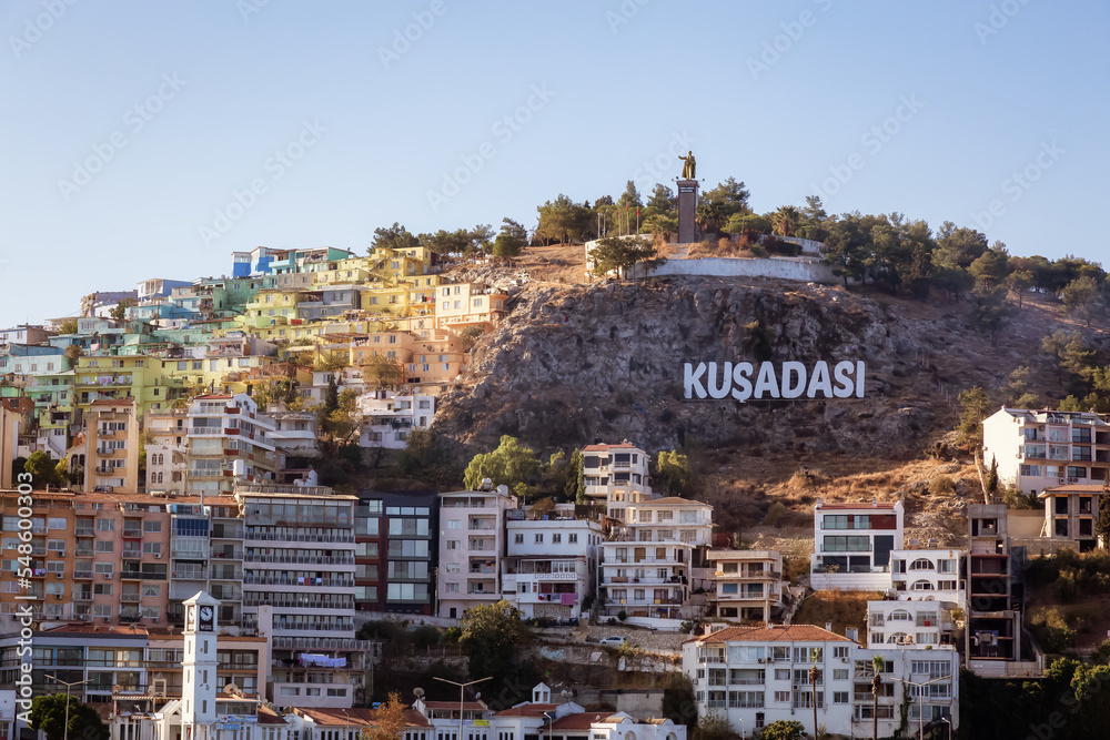 Homes and Buildings in a Touristic Town by the Aegean Sea. Kusadasi, Turkey. Sunny Morning Sunrise.