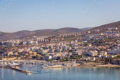 Homes and Buildings in a Touristic Town by the Aegean Sea. Kusadasi, Turkey. Sunny Morning Sunrise. Top of Hill.