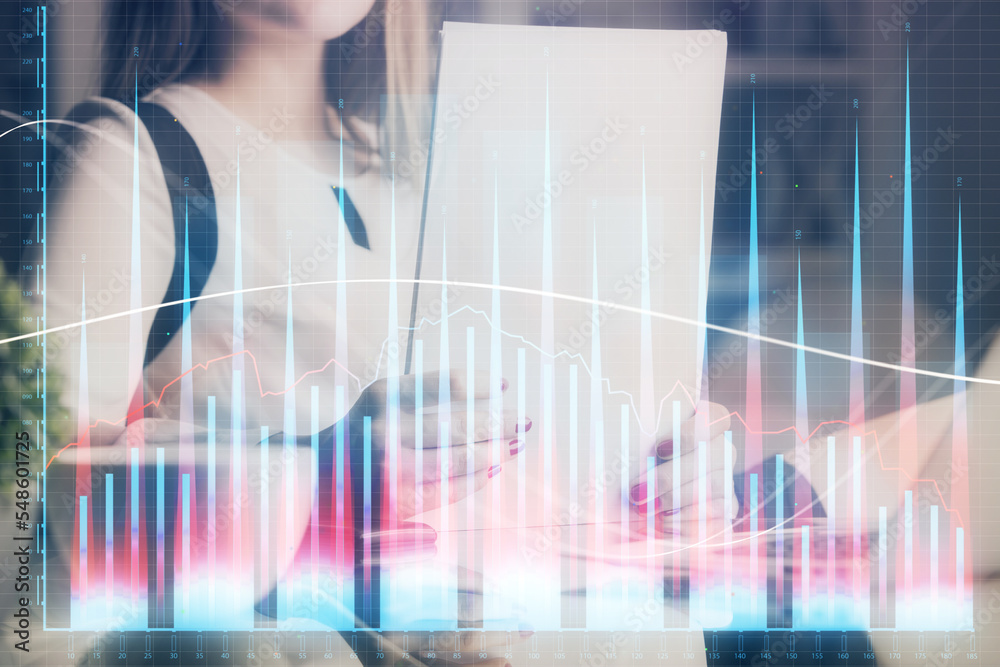 Double exposure of hands making notes with forex chart huds. Stock market concept. Double exposure of hands making notes with forex chart huds. Stock market concept.