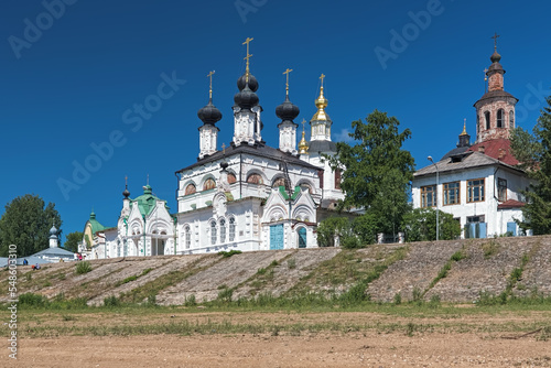Veliky Ustyug, Russia. Cathedral of St. Procopius of Ustyug and other churches at Cathedral square on the left bank of Sukhona river. The cathedral was built in 1668 over the remains of the saint. photo