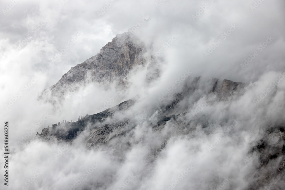 Obraz premium Stormy clouds over Cristallo mountains in the Dolomites, Italy, Europe