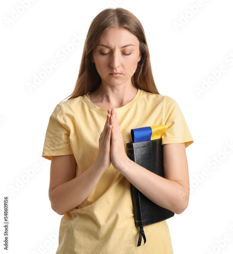 Young woman with Holy Bible...