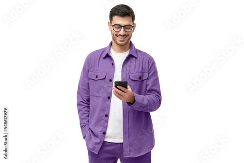 Smiling man wearing casual purple shirt looking at phone