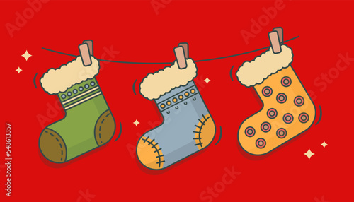 Christmas stockings in cartoon style vector illustration. Hanging Christmas socks with ornaments