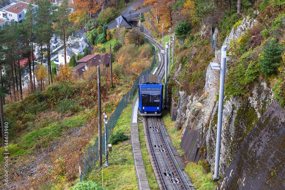 Fototapeta premium Floibanen funicular to Mt Floyen at Bergen City, from Top of Mount Floyen Glass Balcony Viewpoint mountain in Norway