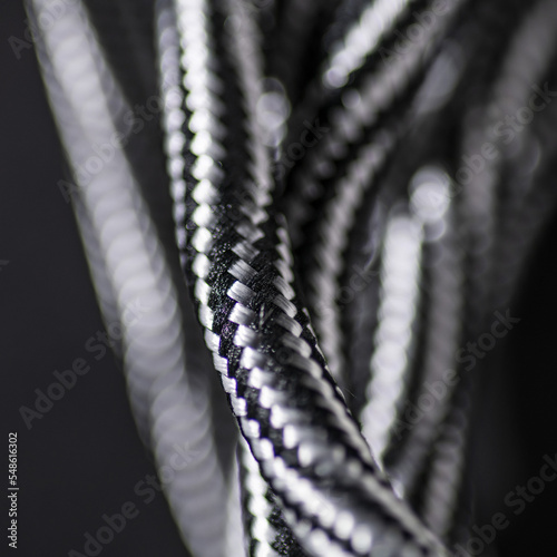 Black and White Braided Cable on Black Background