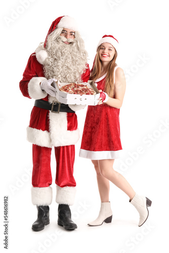 Young couple in Santa costu...