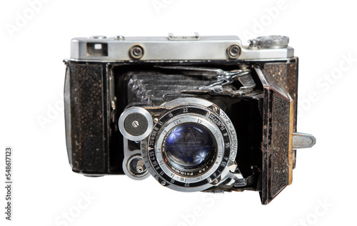 Retro film photo camera isolated on white background