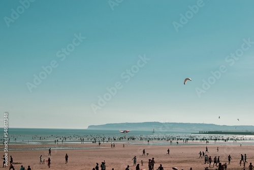 View of the crowded beach in Camber Sands, East Sussex UK photo