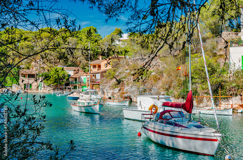 Fotobehang Caló d'En Boira - romantic bay of Cala Figuera with anchoring boats-3913