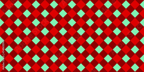 Seamless diagonal gingham diamond checkers christmas wrapping paper pattern in mint green and candy cane red. Geometric traditional xmas card background, gift wrap texture, or winter holiday backdrop.