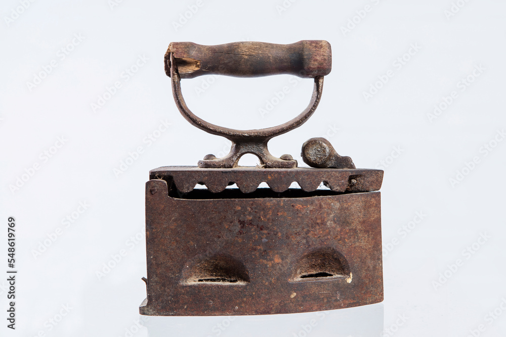 Old iron isolated on white background. High quality photo Old iron isolated on white background. High quality photo