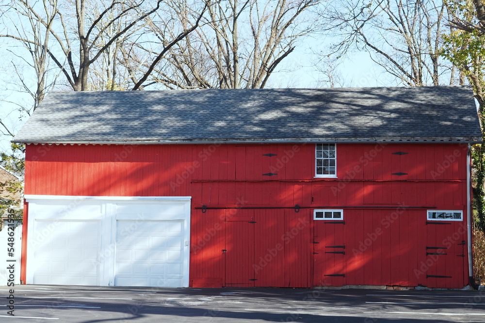 The red barn has a 2 car garage which s unusual.