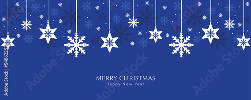 Merry Christmas greeting card, design of xmas with snowflakes hanging on blue christmas background.