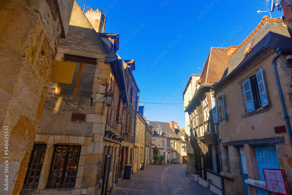 Scenic view of historic half-timbered houses in Montlucon commune in central France on sunny summer day