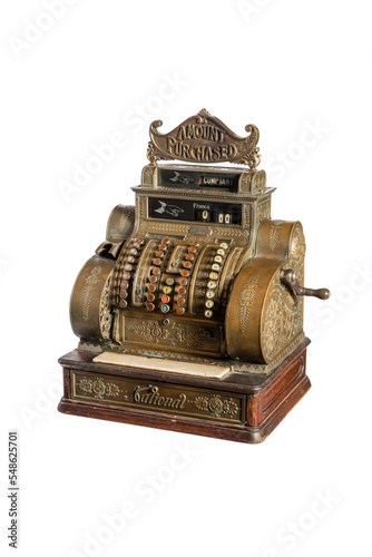 Old-time cash register in a shop. Isolated on white background.