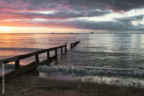 Scenic view of a beach during sunset in Shanklin, Isle of Wight, England, United Kingdom photo