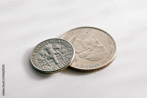 Two US coins on white background photo