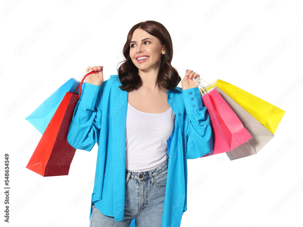 Beautiful young woman with paper shopping bags on white background Beautiful young woman with paper shopping bags on white background