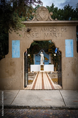 Vertical shot of an arched entrance of the Friends of Jose Marti park in district of Ybor city photo