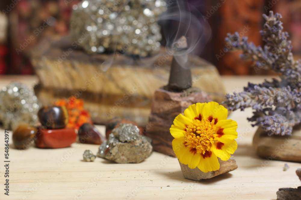 Incense Cone on Stone With Crystals and Flowers. Meditation Table Incense Cone on Stone With Crystals and Flowers. Meditation Table