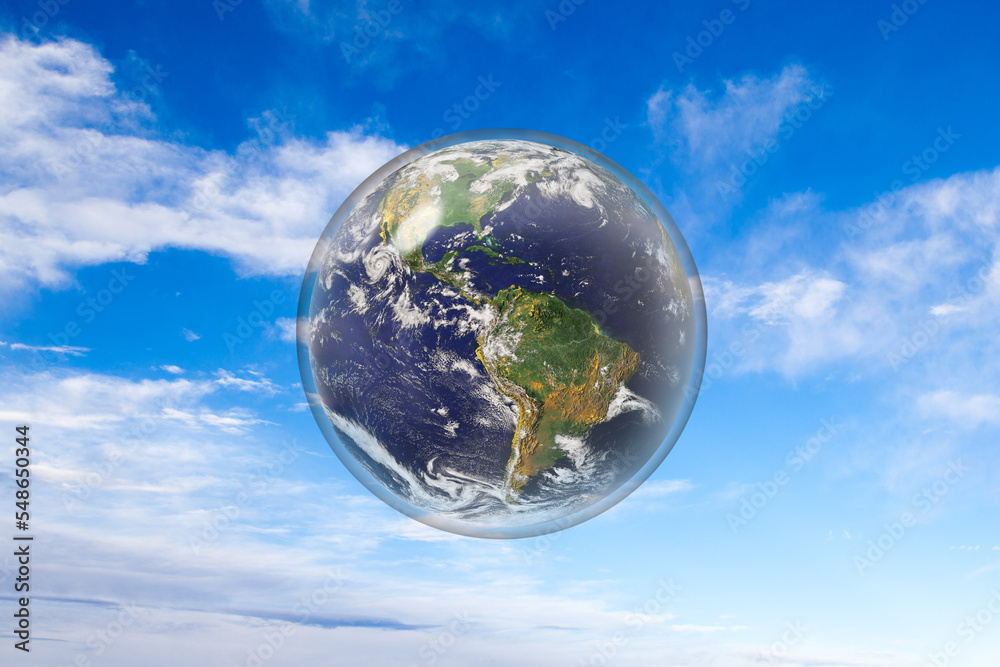 Protect the earth, climate change concept. Fragile earth enclosed in glass sphere.