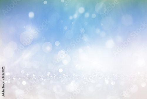 Abstract of Bright and sparkling bokeh background. silver and diamond dust bokeh -blurred lighting from glitter texture. Luxury design background.