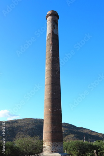 View of the tip of an old industrial chimney called "La Ramona" and located in El Triunfo, Baja California Sur, Mexico