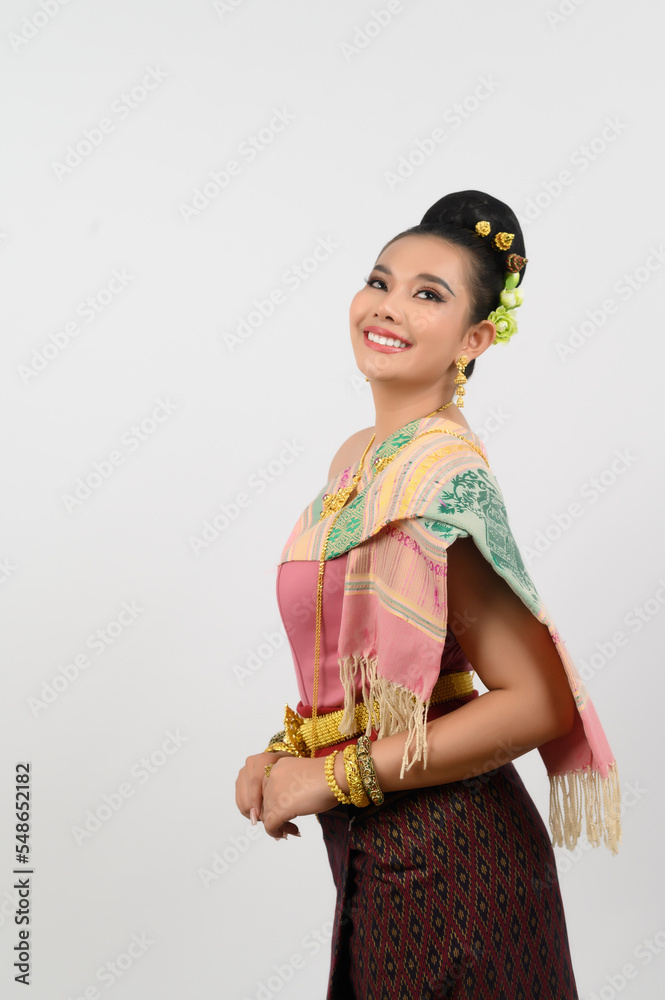 Portrait of Beautiful Woman in Thai northeastern Traditional Clothing standing Posing Portrait of Beautiful Woman in Thai northeastern Traditional Clothing standing Posing
