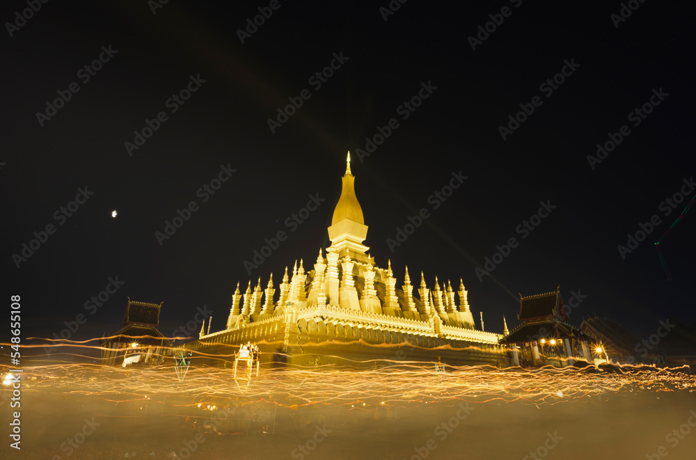Naklejka premium Pha That Luang festival Vientiane, Laos. That-Luang Golden Pagoda in Vientiane, Laos. This place is history of laos and Pha That Luang is know to foreign tourists.