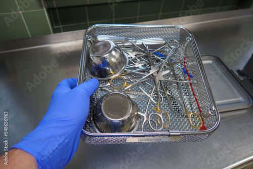 various surgical instruments are located in an instrument basket