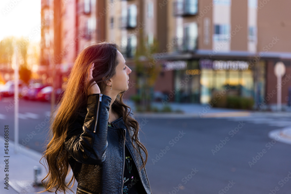 Young confident woman walking in the city Young confident woman walking in the city
