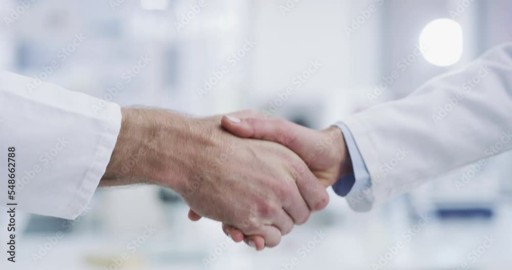 Doctor, handshake and science for b2b, partnership or agreement in teamwork trust at the hospital. Healthcare professionals shaking hands for introduction, welcome or meeting in medical clinic or lab Doctor, handshake and science for b2b, partnership or agreement in teamwork trust at the hospital. Healthcare professionals shaking hands for introduction, welcome or meeting in medical clinic or lab