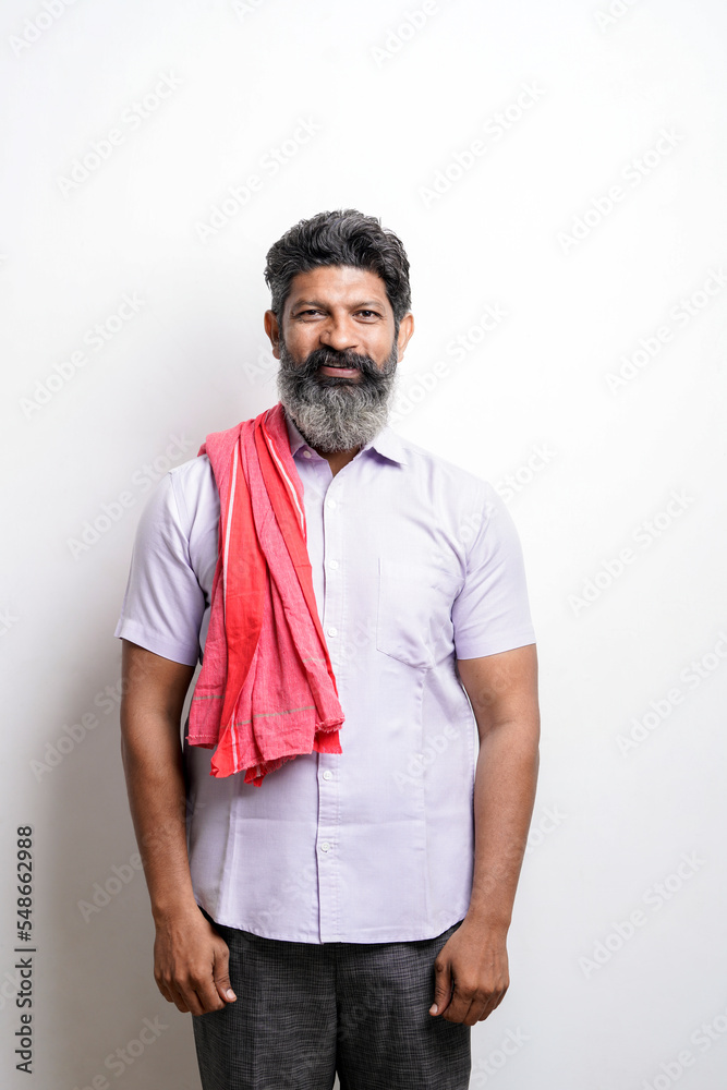 Indian farmer giving expression on white background.