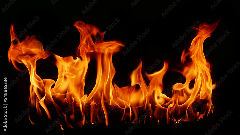 Flame Flame Texture For Strange Shape Fire Background Flame meat that is burned from the stove or from cooking. danger feeling abstract black background Suitable for banners or advertisements.