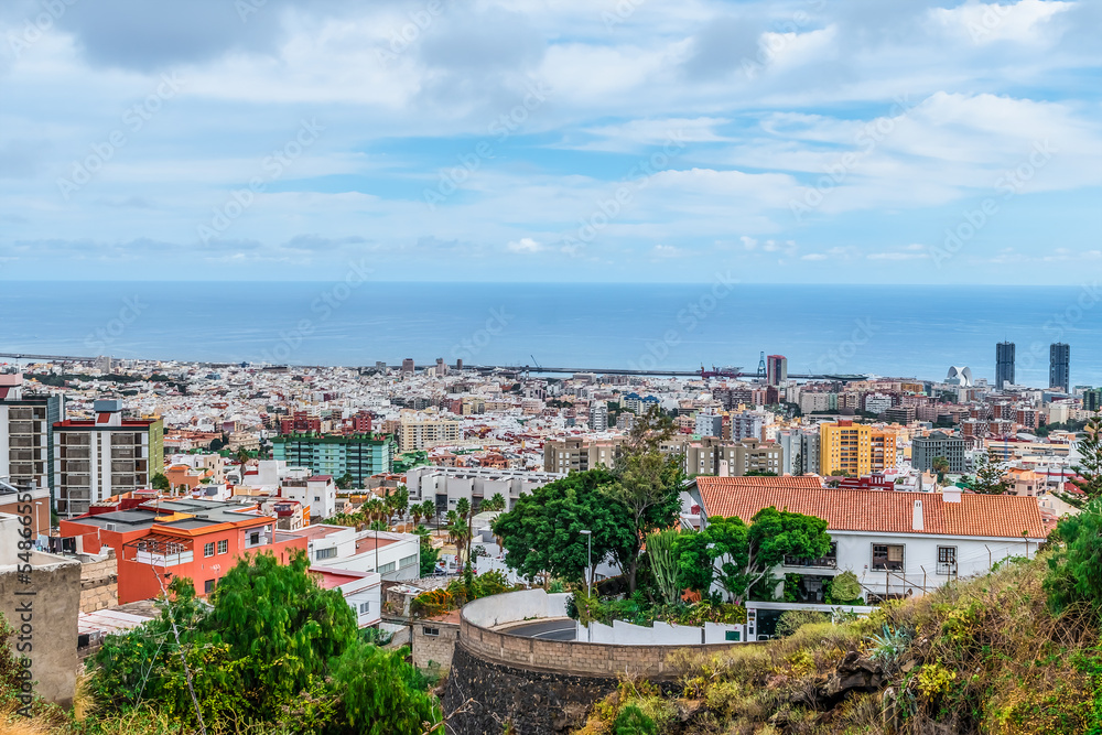 Aerial view of the panorama of Santa Cruz de Tenerife and the Atlantic Ocean on the horizon, Spain. Cityscape in the Canary Islands