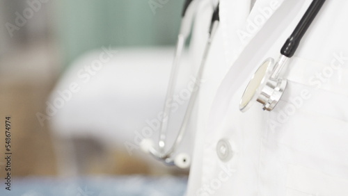 Stethoscope with white operating clothes  examining room  at the hospital