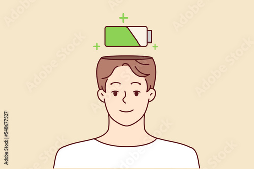 Smiling man with battery above head charging to full capacity. Happy male charge health or life accumulator. Vector illustration. 