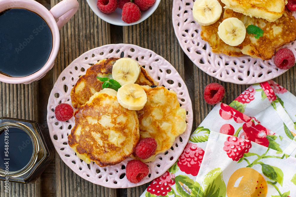 Sweet fruit pancakes with apples, bananas and raspberries Sweet fruit pancakes with apples, bananas and raspberries