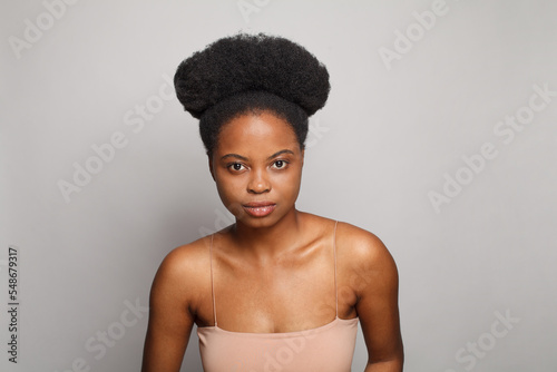 Young healthy woman on white background