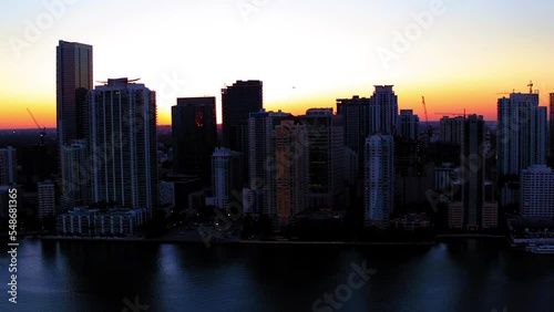 Wallpaper Mural Aerial Panning Shot Of Modern Residential Buildings In City While Airplane Flying In Orange Sky - Miami, Florida Torontodigital.ca