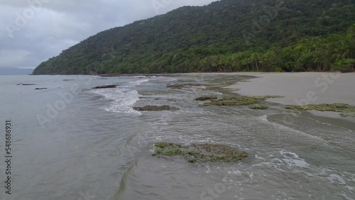 Drone Fly Over Coral Reefs At The Water Surface At Daintree National Park In Cape Tribulation, North Queensland, Australia. Aerial Shot photo