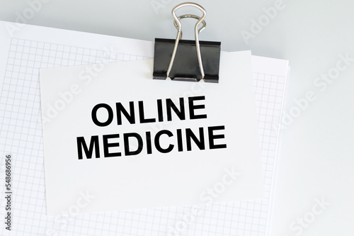 a business card with the text ONLINE MEDICINE.