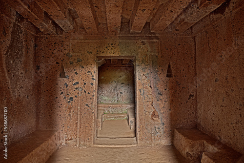 Barbarano Romano, Viterbo, Lazio, Italy: Etruscan necropolis of San Giuliano, interior of an ancient tomb, 2500 years old, with the symbol of the door to the afterlife  photo
