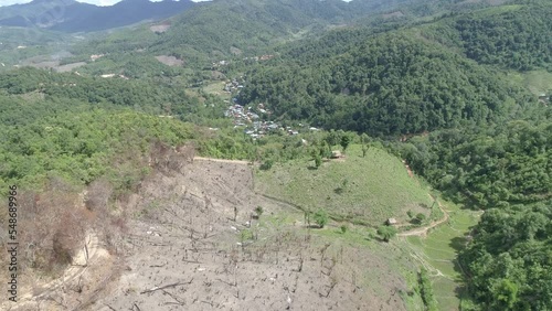 High angle view of a northern rural village in the valley Ban Thung Ton Ngio,  Mae Tuen, Omkoi district, Chiang Mai, Thailand. photo