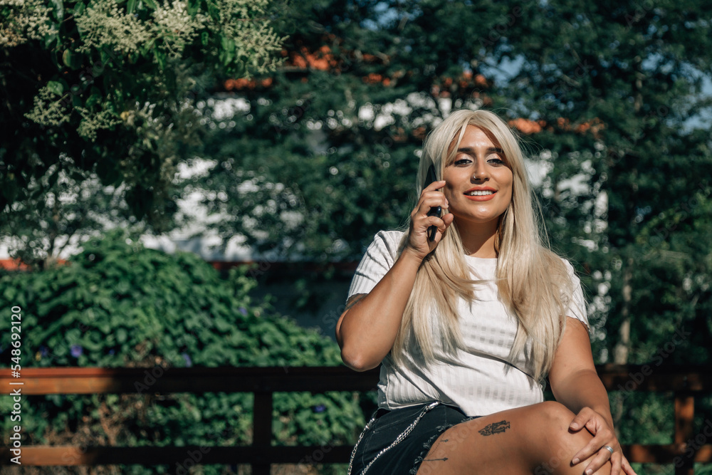 happy positive plus size beautiful woman with smartphone happy positive plus size beautiful woman with smartphone