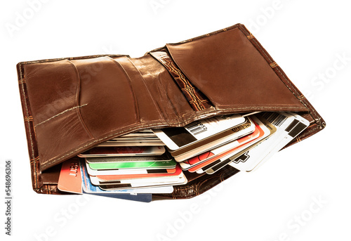 leather wallet full of credit cards, isolated photo