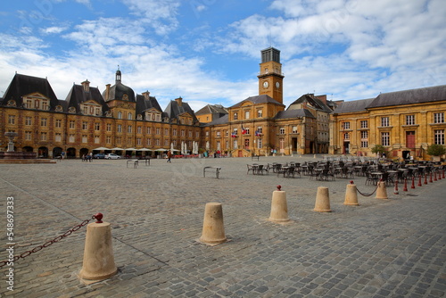 The main square Place Ducale in Charleville Mezieres, Ardennes, Grand Est, France, with house facades, arcades and cobbled pavement. Place Ducale in an architectural gem dated from 17 century photo