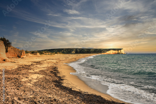 Empty view of Gökçeada Kefalos beach with cloudy sky. Gokceada, Imbros island. Canakkale, Turkey photo